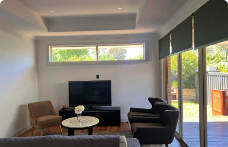 Alternate view of the spacious living room with seating area.
